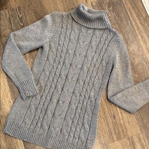 Gray cable knit turtleneck sweater